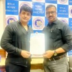 Hanshi Premjit Sen receiving his appointment letter as "Deputy Chef De Mission" from the President of Bengal Olympic Association (BOA), Sri Swapan Banerjee for the 36th National Games 2022 in Gujrat.
